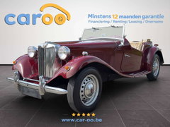 MG